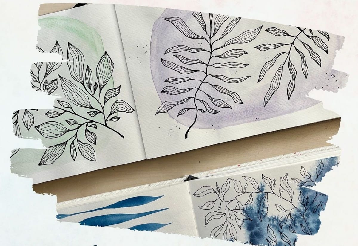 Ink leaves drawn over soft green, purple and blue watercolor washes